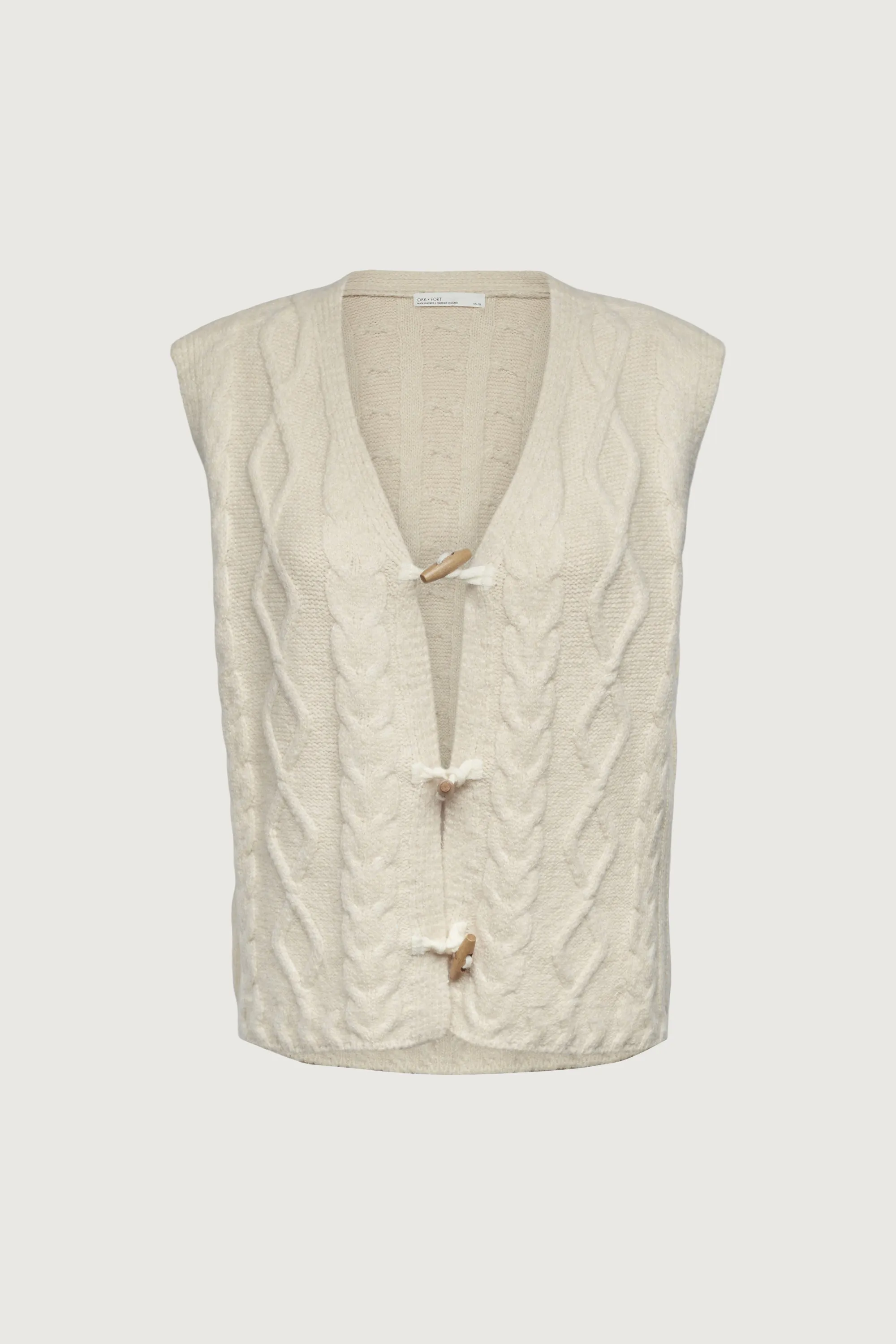 CABLE KNIT VEST WITH TOGGLES