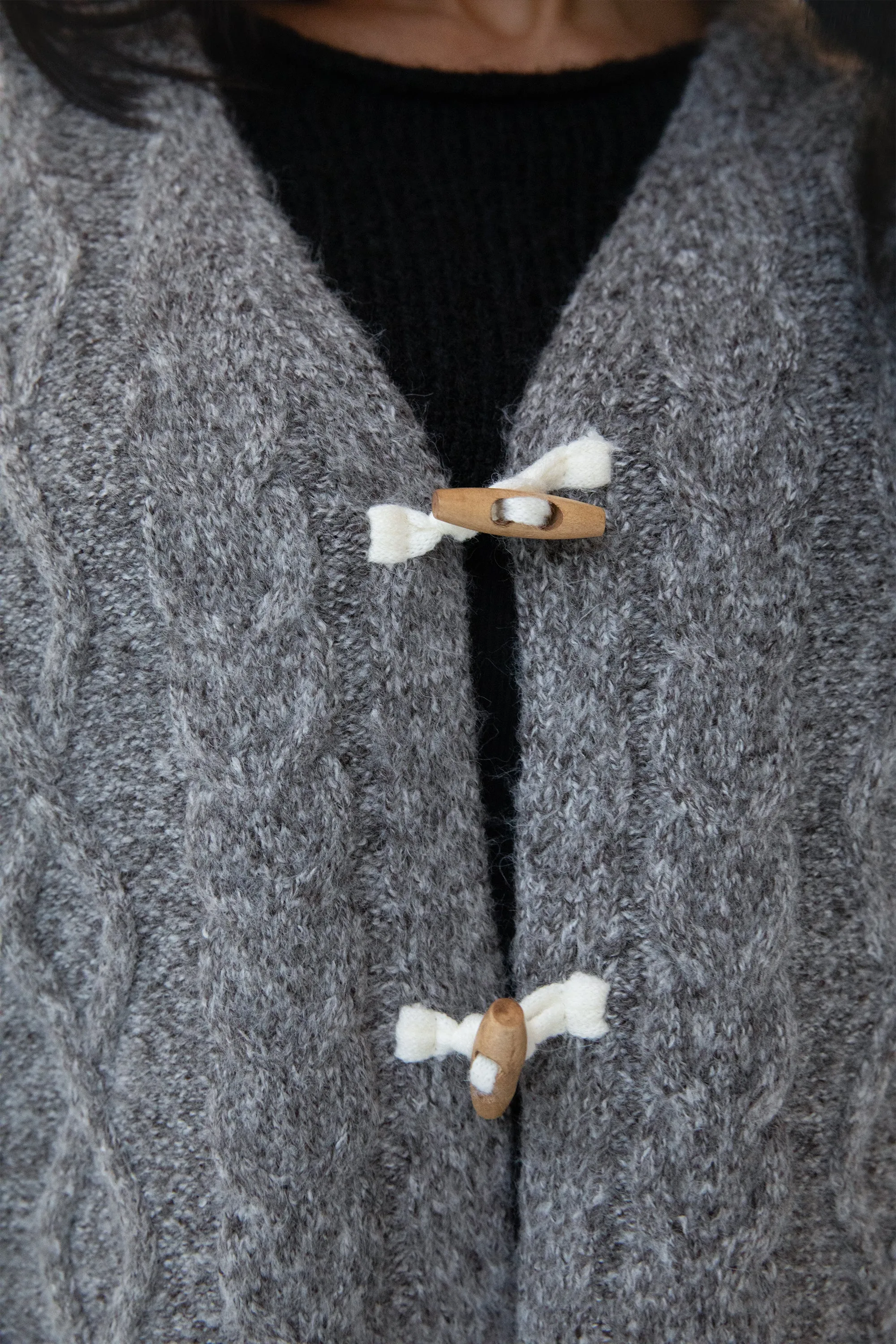 CABLE KNIT VEST WITH TOGGLES